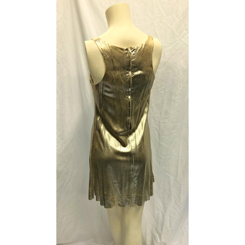 119 - FIVE 1950s SILVER LUREX SCI-FI MINI DRESSES
all by Paraphernalia and with 20th Century Fox labels, s... 