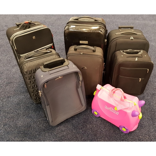 36 - SELECTION OF EIGHT SUITCASES 
various sizes. Including trunki
Note: Suitcases and bags are empty