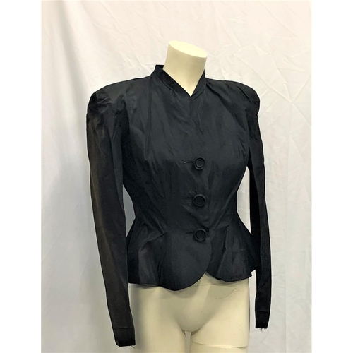22 - MARY PICKFORD OWNED SATIN JACKET
handmade in black satin material with sewn in shoulder pads. Long s... 