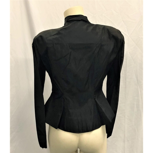 22 - MARY PICKFORD OWNED SATIN JACKET
handmade in black satin material with sewn in shoulder pads. Long s... 