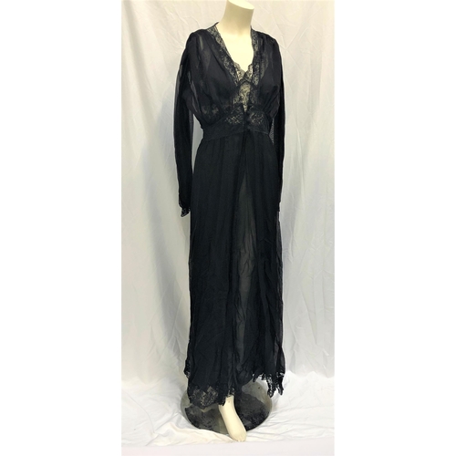 23 - MAE WEST OWNED BLACK LACE NEGLIGEE SET
the set consists of a gown and a robe. The set is made of a b... 