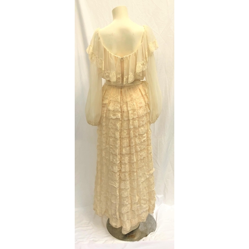 25 - CLAUDETTE COLBERT OWNED LIGHT PEACH COLOURED AFTERNOON DRESS
the handmade dress with lace detail. Ac... 