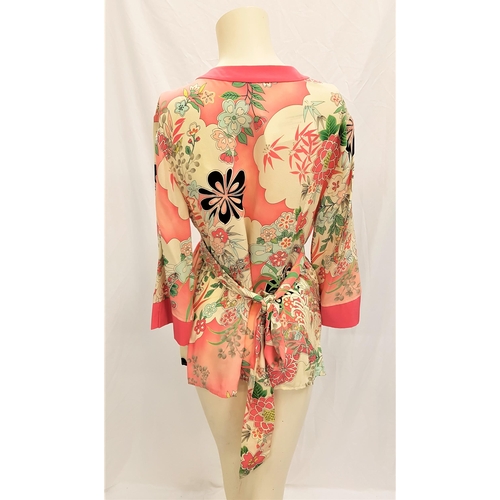 32 - CATHERINE OXENBERG - FLORAL BLOUSE
by Mimi Maternity, size M, with back tie, signed to label. Accomp... 
