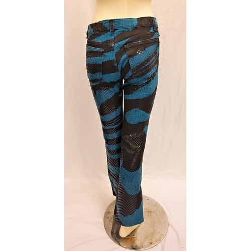 36 - CARMEN ELECTRA - 'ROBERTO CAVALLI' BLUE TIGER PRINT TROUSERS
with sequined detail, size XS. Accompan... 