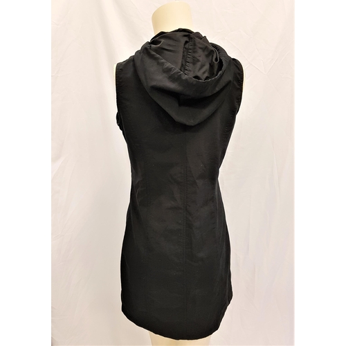 40 - CARMEN ELECTRA - BLACK ZIP FRONT DRESS
with hood, size 10. Accompanied by Star Wares Collectibles ce... 