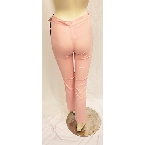 42 - CARMEN ELECTRA - 'TOMMY JEANS' PINK STRETCH MATERIAL TROUSERS
with tags, Size 1. Accompanied by Star... 