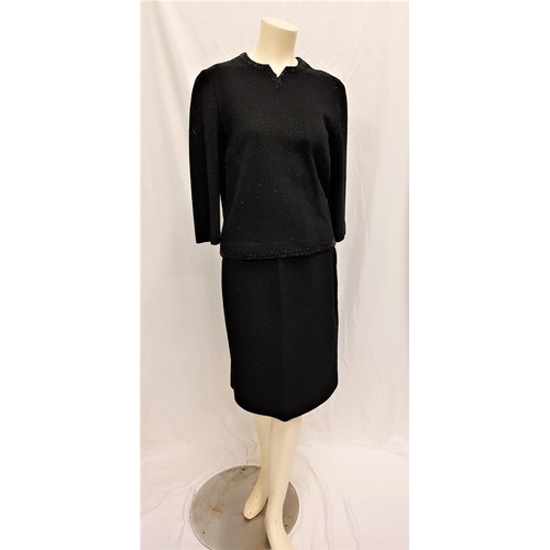 44 - MIMI ROGERS - 'BUTTE KNIT' VINTAGE BLACK WOOL TOP AND MATCHING SKIRT
the top with beaded hem and nec... 
