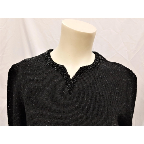44 - MIMI ROGERS - 'BUTTE KNIT' VINTAGE BLACK WOOL TOP AND MATCHING SKIRT
the top with beaded hem and nec... 