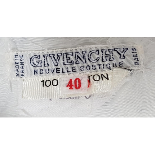 51 - 1960s GIVENCHY NOUVELLE BOUTIQUE SUIT
the white cotton suit comprising a short sleeved jacket and sk... 