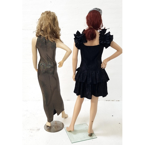 52 - TWO 1980s VINTAGE DRESSES
comprising a sparkly black Rara dress, with frilly shoulders, bow detail t... 