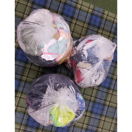 37 - THREE BAGS OF KIDS CLOTHING ITEMS
including Champion, Nike, Next, H&M, United Colors of Benetton, To... 