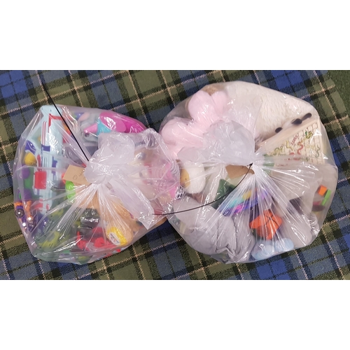 41 - TWO BAGS OF TOYS AND GAMES
Including: soft toys, action figures, dolls and games