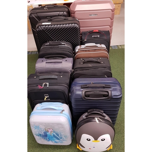 42 - SELECTION OF TWELVE SUITCASES 
various sizes. Including Samsonite, Louis Kaiser and Skyflight
Note: ... 