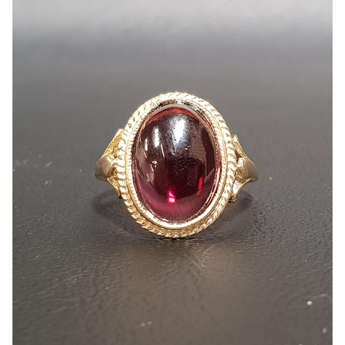 109 - GARNET SINGLE STONE RING
the oval cabochon garnet in nine carat gold, ring size O-P