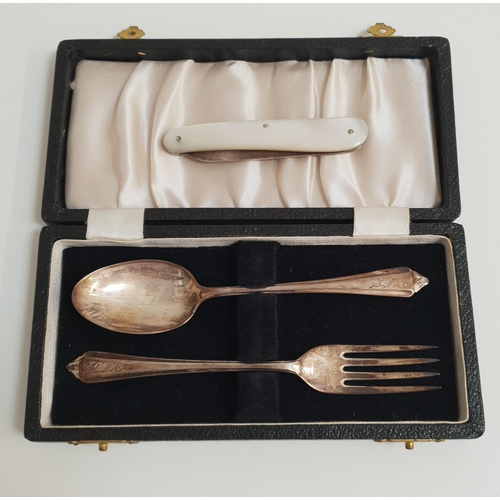 119 - ELIZABETH II SILVER CHRISTENING SET
comprising a fork and spoon, the terminals engraved S.M.C., Birm... 