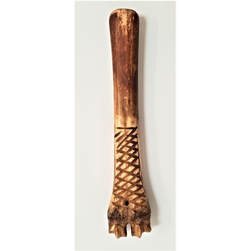 180 - 19th CENTURY CARVED BONE CHEESE SCOOP
with lattice style carved decoration, 14cm long