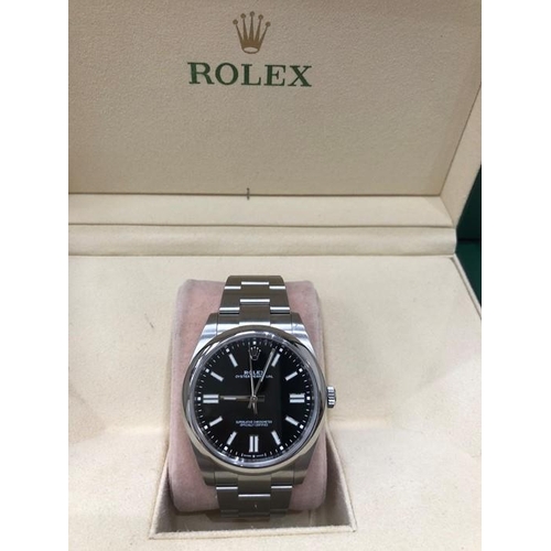 56 - Rolex Oyster Perpetual 41mm Black Dial ref 124300  In mint condition all original parts Comes accomp... 