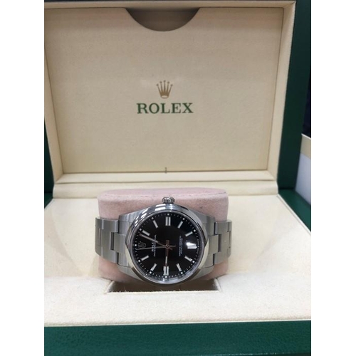 56 - Rolex Oyster Perpetual 41mm Black Dial ref 124300  In mint condition all original parts Comes accomp... 