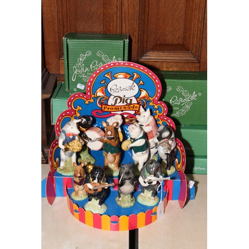 37 - Beswick Pig Promenade Band, eleven pieces with card stage set.