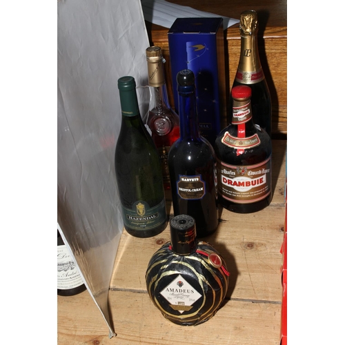 51 - Seven bottles of assorted alcohol including two Martell Cognac, Laurent Perrier Champagne, Amadeus O... 