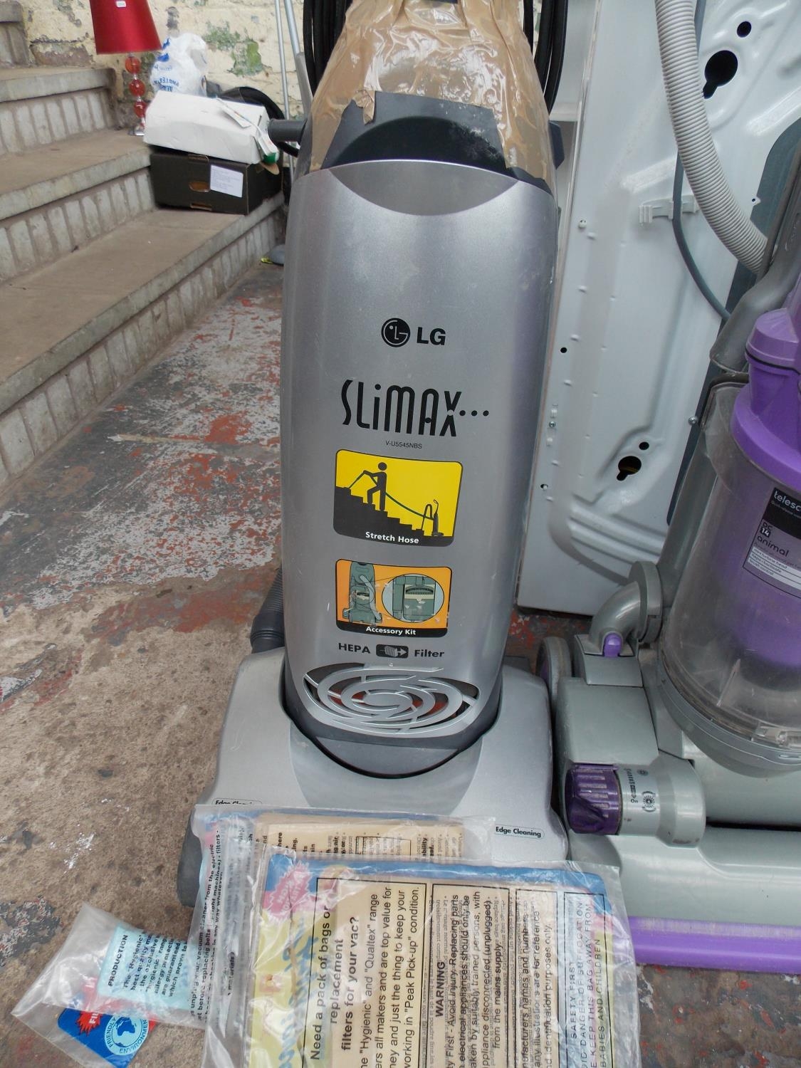 an lg slimax upright vacuum cleaner AN LG SLIMAX UPRIGHT VACUUM CLEANER