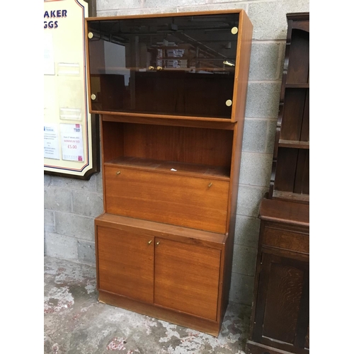 A Retro 1970 S Teak Display Cabinet With Two Upper Black Glass