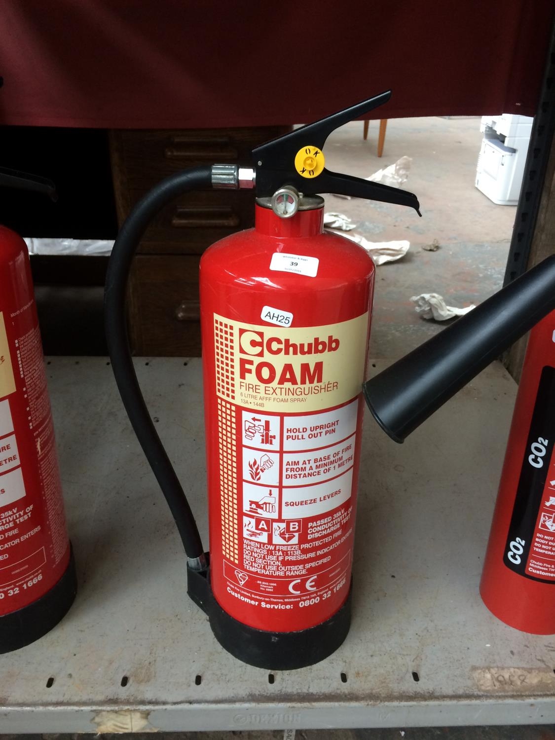 A Chubb Full 2kg Carbon Dioxide Fire Extinguisher And Two Chubb 6 Litre Full Foam Fire Extinguis 