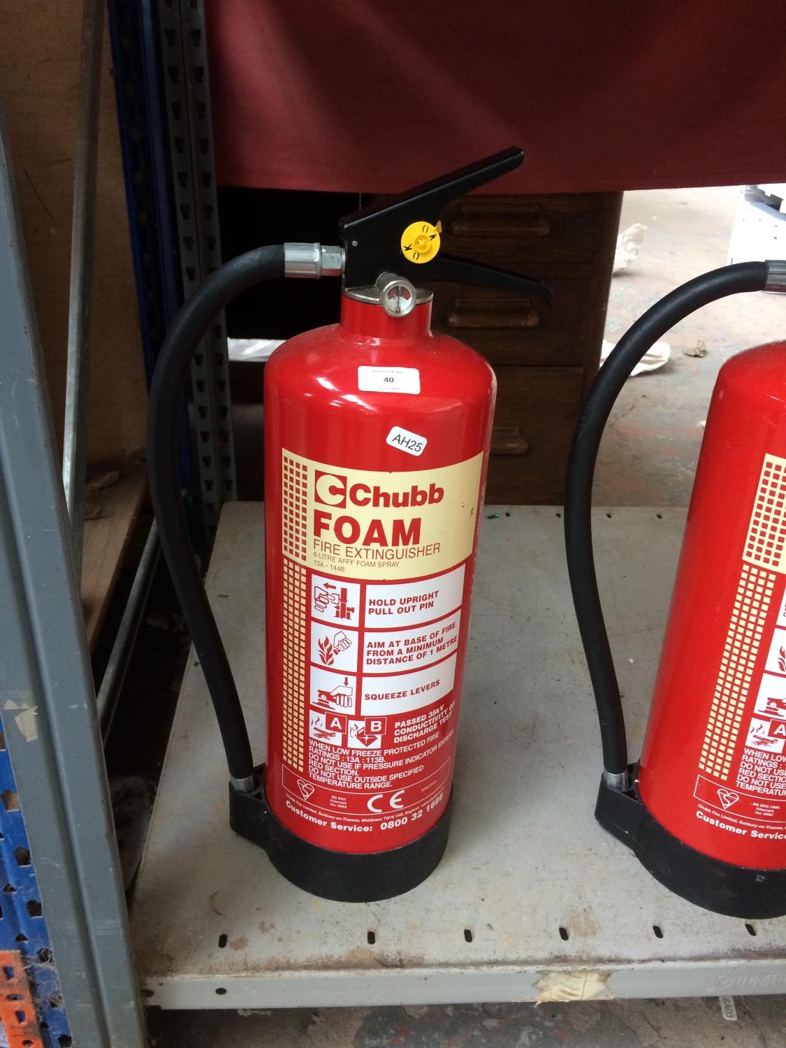 A CHUBB, FULL, 2KG CARBON DIOXIDE FIRE EXTINGUISHER AND TWO CHUBB 6