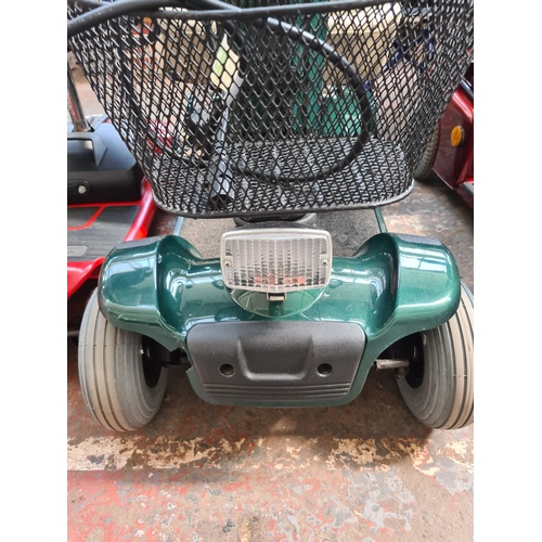 A CRAFTMATIC COMFORT COACH IV GREEN MOBILITY SCOOTER WITH KEY AND
