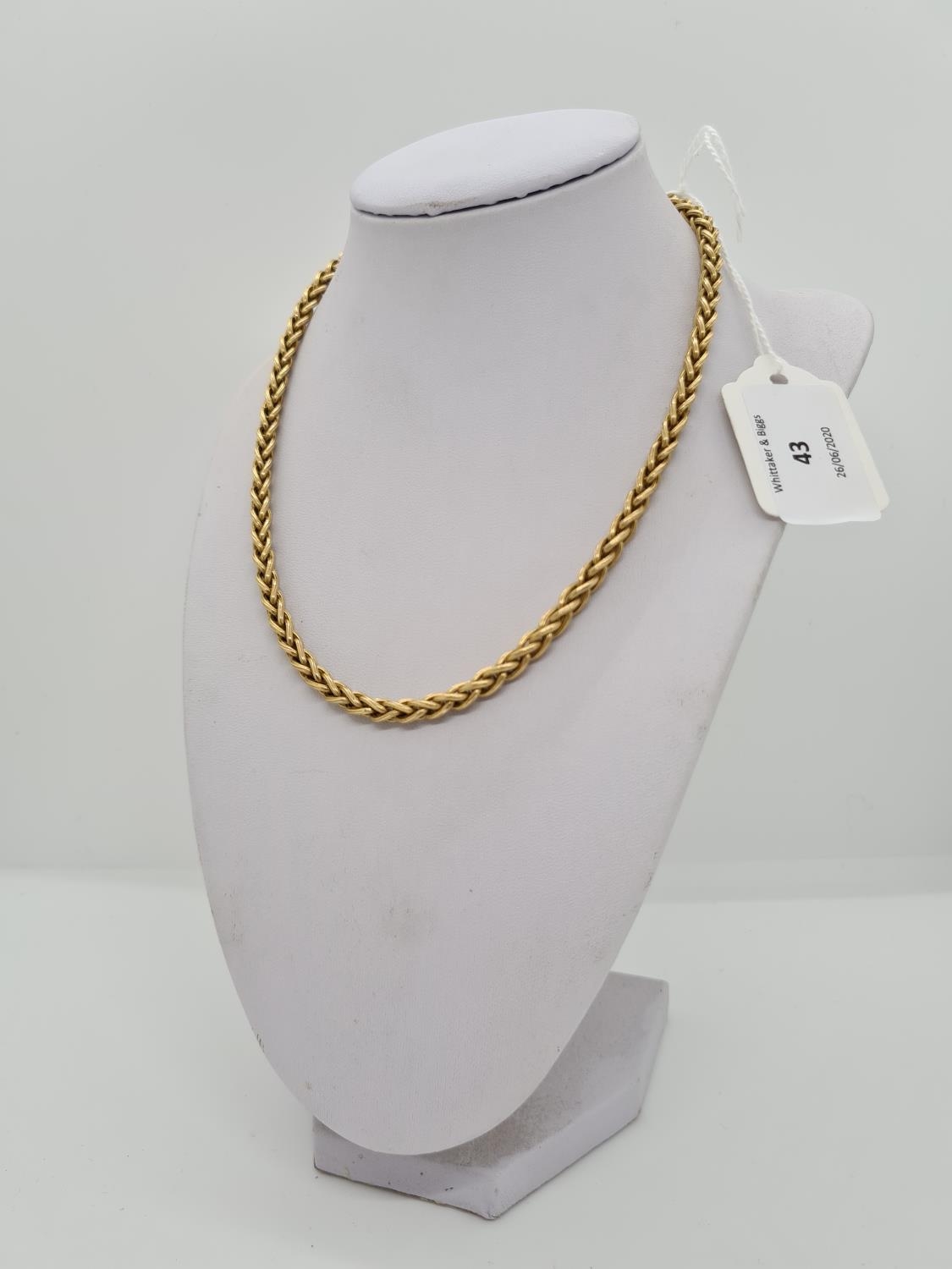 A HALLMARKED 18CT YELLOW GOLD ROPE 