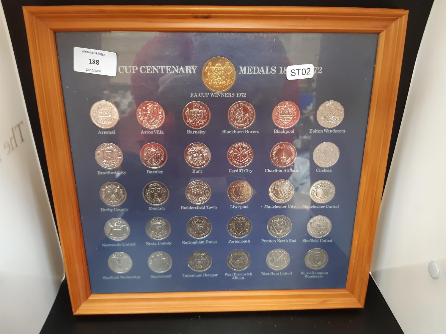 A framed complete set of Esso FA Cup centenary coins from 1872-1972