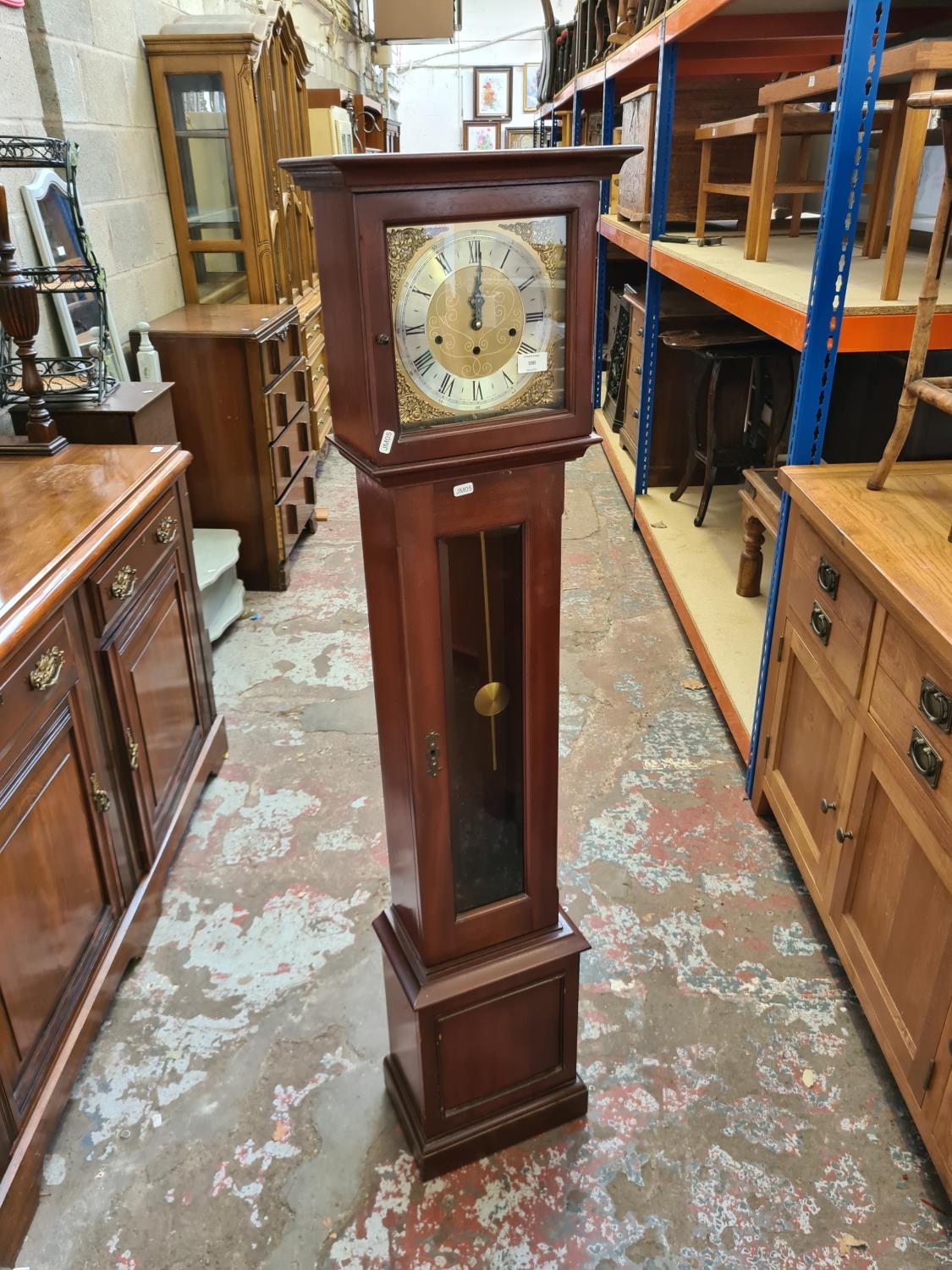 A vintage Metamec mahogany cased westminster chime grandmother clock