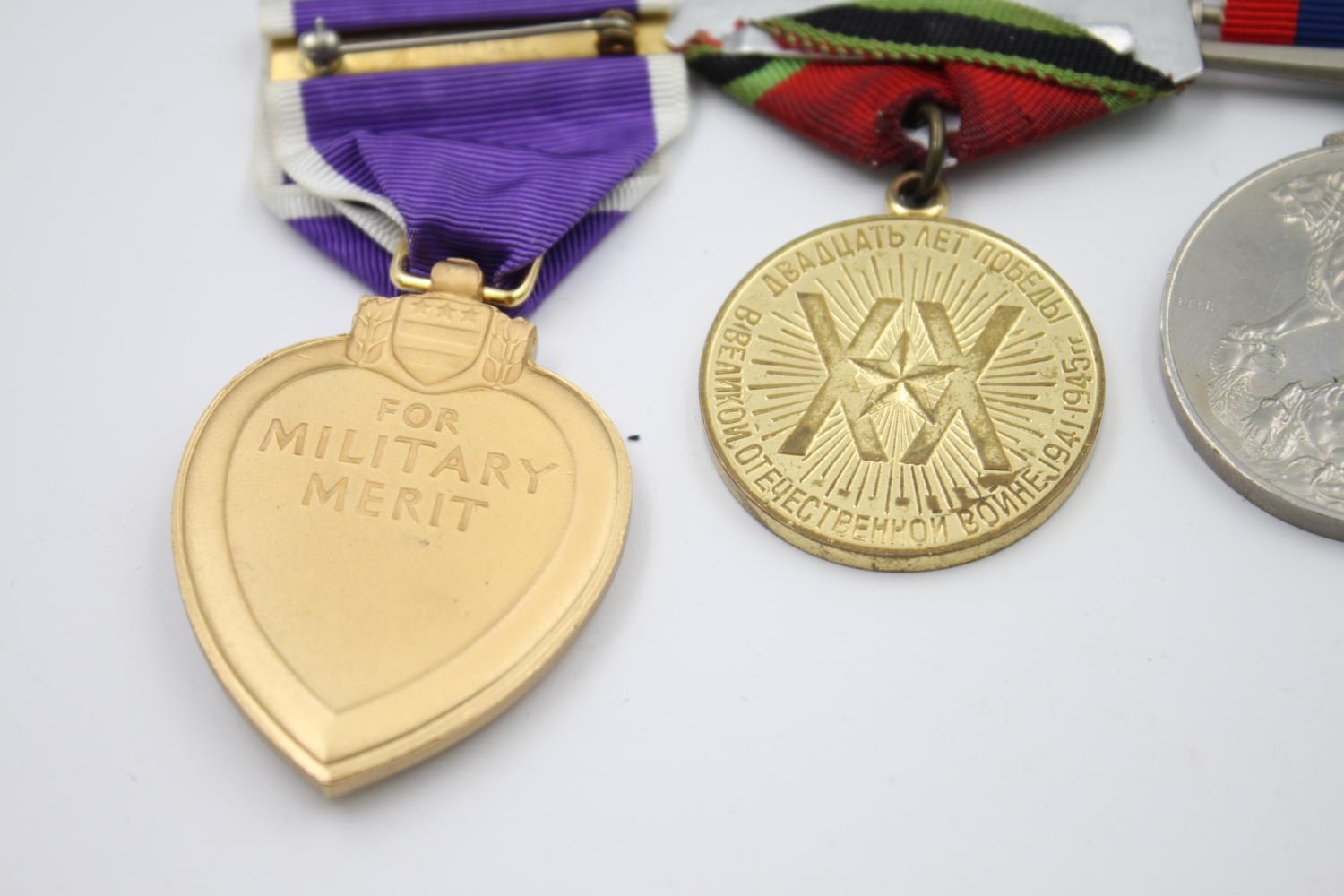 Five assorted vintage military medals to include boxed Artillery medal