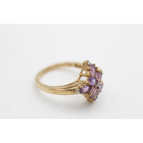 56 - A 9ct gold diamond and amethyst cluster ring, size P - approx. gross weight 2.9 grams