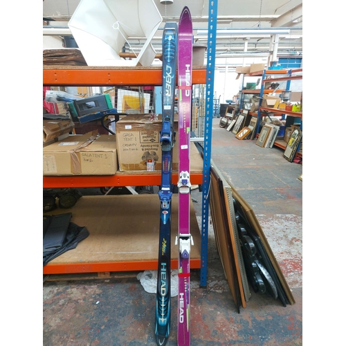 Two pairs of Head snow skis, one Elektra Radial and one Cybe... Barnebys