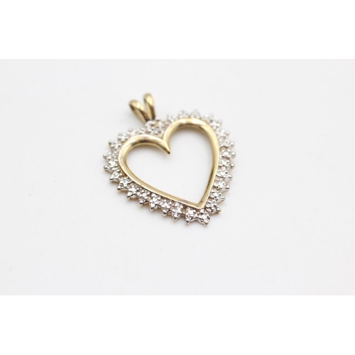 10 - Two 9ct yellow and white gold diamond set heart pendants - approx. gross weight 3.2 grams