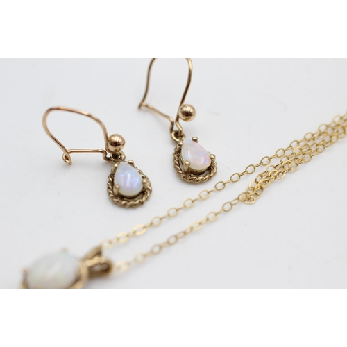 22 - A 9ct gold opal drop earrings and solitaire pendant necklace set - approx. gross weight 2.2 grams