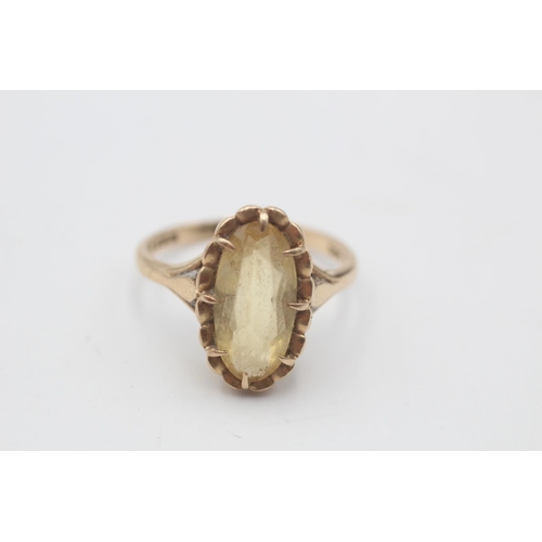 25 - A 9ct gold citrine solitaire cocktail ring, size M - approx. gross weight 2.9 grams