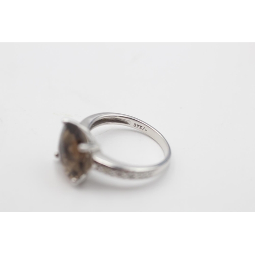 27 - A 9ct white gold smoky quartz and diamond dress ring, size K½ - approx. gross weight 3.1 grams
