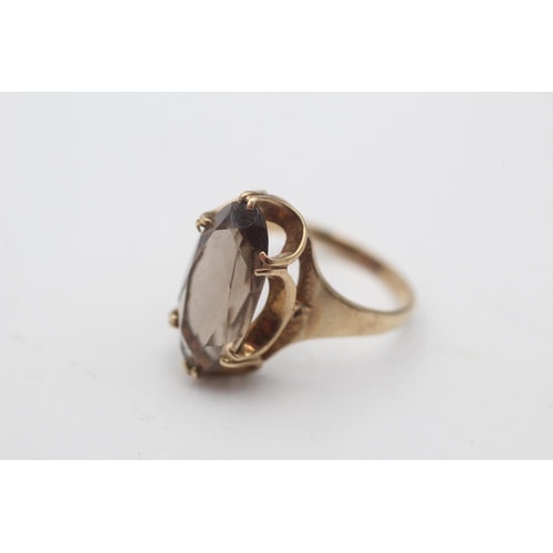 29 - A 9ct gold smoky quartz solitaire statement ring, size M½ - approx. gross weight 3.1 grams