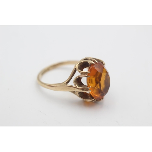 31 - A hallmarked Birmingham 9ct gold orange paste solitaire buttercup setting cocktail ring, size N½ - a... 
