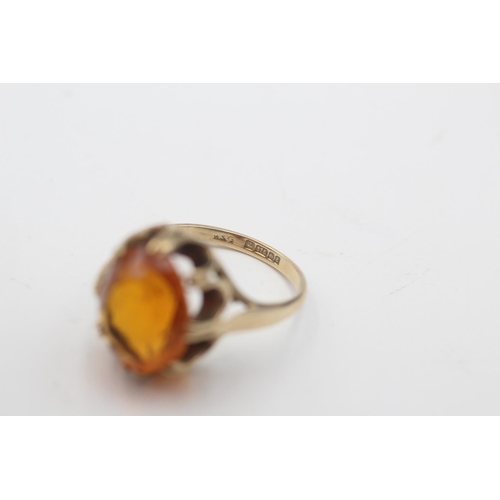 31 - A hallmarked Birmingham 9ct gold orange paste solitaire buttercup setting cocktail ring, size N½ - a... 