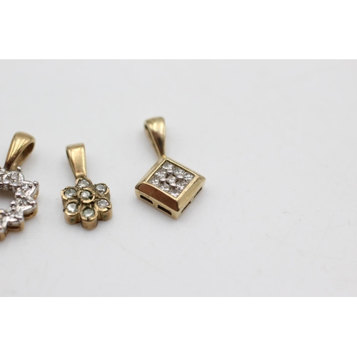 34 - Three 9ct gold diamond pendants, one heart, one flower and one square - approx. gross weight 2.5 gra... 