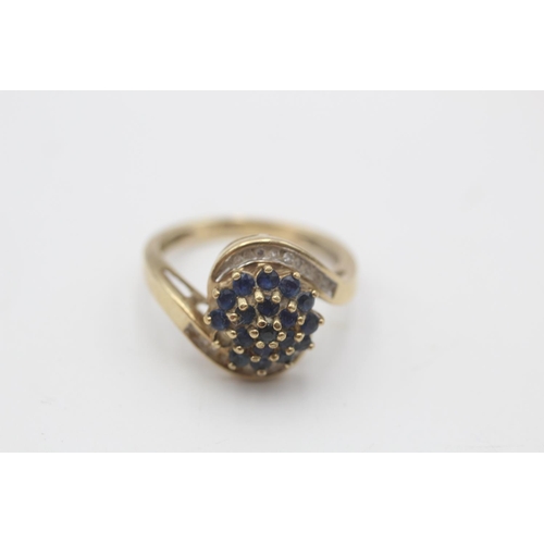 35 - A hallmarked Birmingham 9ct gold sapphire and diamond cluster twist setting dress ring, size O - app... 