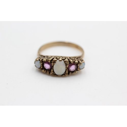 51 - A 9ct gold opal and ruby five stone foliate gypsy setting ring, size O½ - approx. gross weight 3.6 g... 