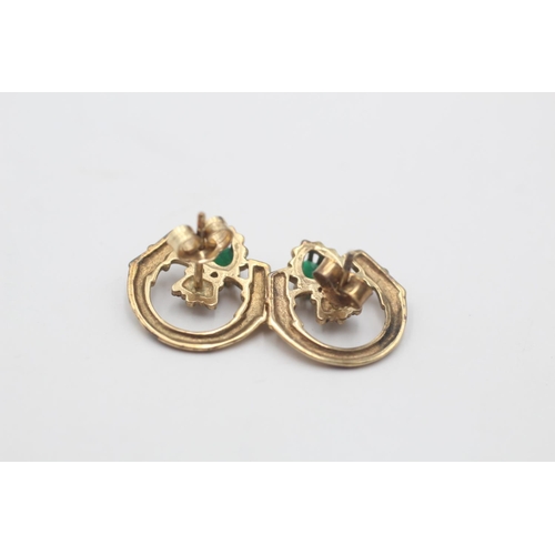8 - A pair of 9ct gold green paste heart claddagh stud earrings - approx. gross weight 2 grams