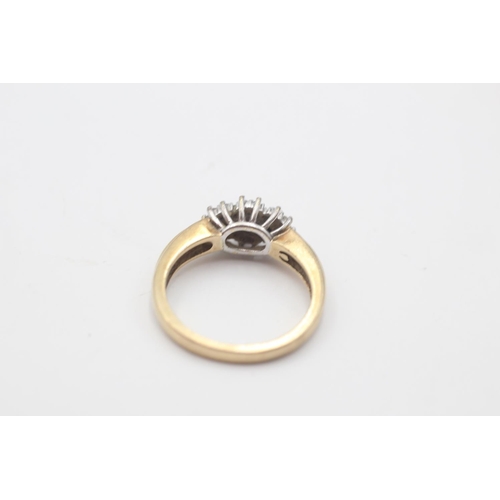 9 - A hallmarked Birmingham 9ct gold sapphire and diamond three halo ring - approx. gross weight 4.1 gra... 