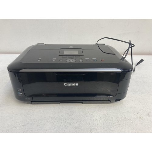 A Canon MG5350 computer printer Barnebys
