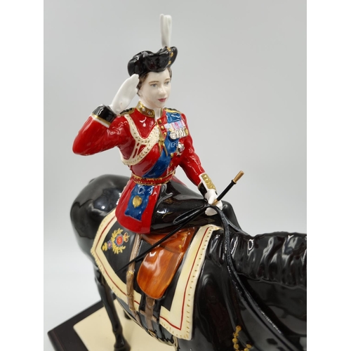 28 - A Coalport 'Trooping The Colour' limited edition no. 371 of 450 English fine bone china figurine wit... 