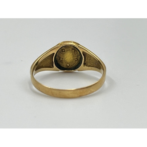 1102 - An antique hallmarked Birmingham 18ct gold black enamel and seed pearl mourning ring, size O - appro... 